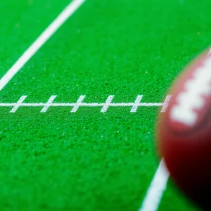 Football field with abstract symbols representing contract negotiations