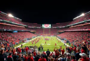 Fans cheering at Texas Tech vs Houston football game