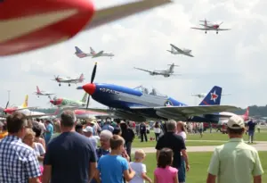 Airshow at Ellington Airport with diverse aircraft and spectators