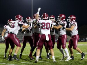 C.E. King Panthers football team celebrating their semifinal victory.