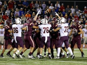 DeSoto Football team celebrating on the field
