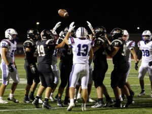 Duncanville Panthers football team celebrating on the field