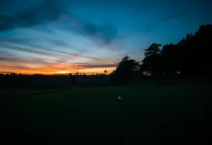 Dramatic scene of a golf course during a crucial moment in a match