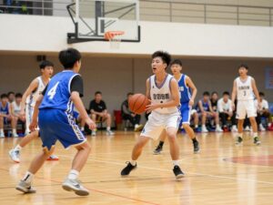 Engaging scene of high school basketball players in action on the court.