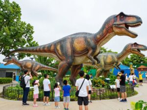 Families enjoying the Dinosaur Adventure exhibit in Houston