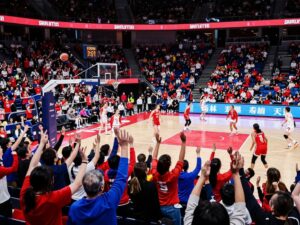 Fans cheering at a women's basketball game in Houston