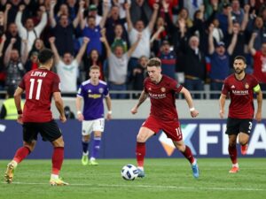 Houston Texans team celebrating on the field