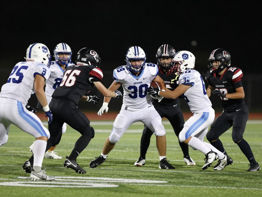 High school football players from the North Shore Mustangs executing a defensive play during a game.