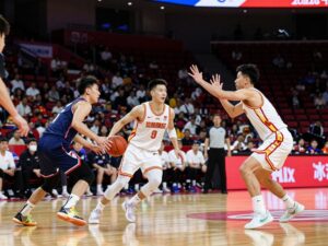 Sam Houston Bearkats and New Mexico State Aggies competing on the basketball court
