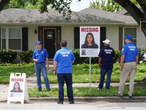 Volunteers searching for a missing person in Houston.