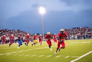Players competing in a Texas high school football semifinal game