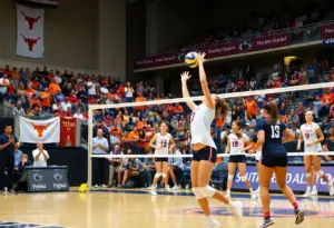 Texas Volleyball team celebrating a victory after defeating Penn State