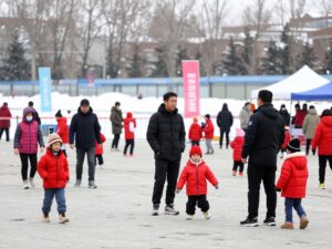 Families enjoying activities at the Astros Fan Fest in a winter setting.