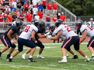 Players of the Bryan Vikings football team practicing on the field.