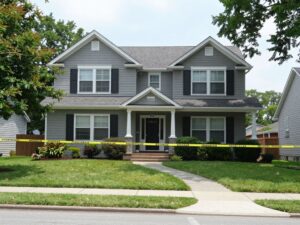 Police activity around a residence in Georgetown after a double homicide.