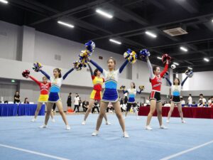 Cheerleading athletes performing at the NCA All-Star National Championship in Houston