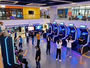 People enjoying virtual reality experiences at Sandbox VR in CityCentre, Houston