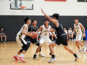 High school basketball game featuring Slocomb Red Tops and Houston Academy Raiders