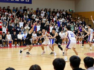 High school basketball players in action on the court