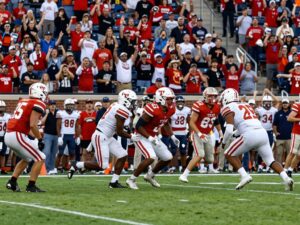 Football players in action during a high school game in Texas