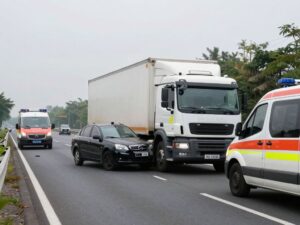 Scene of a fatal crash involving an 18-wheeler and a car on highway