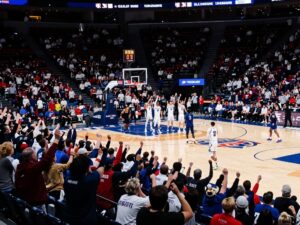 Excited fans at the University of Houston basketball game
