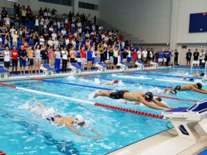 Swimmers competing in the UIL 4A Regional Swim Meet