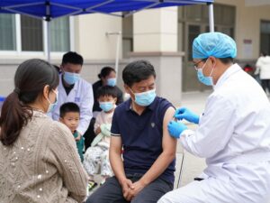 Families receiving vaccines at the Antoine Health Clinic free vaccine event in Houston.
