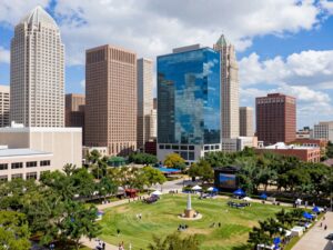 A view of Houston's skyline with ongoing construction projects symbolizing economic growth.