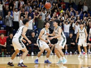 Houston Hilltoppers basketball team playing in a game.