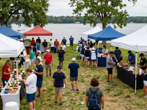 A busy farmers market in Lake Houston with local vendors and families enjoying the day.