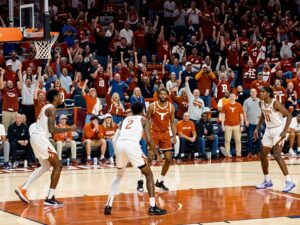 Texas Longhorns basketball team celebrating their victory against Missouri