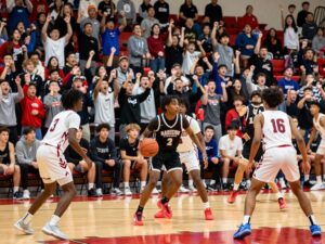 High school basketball players competing in San Antonio game.