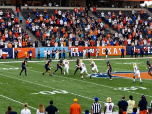 Texas high school football teams during a match showcasing UIL realignment changes.